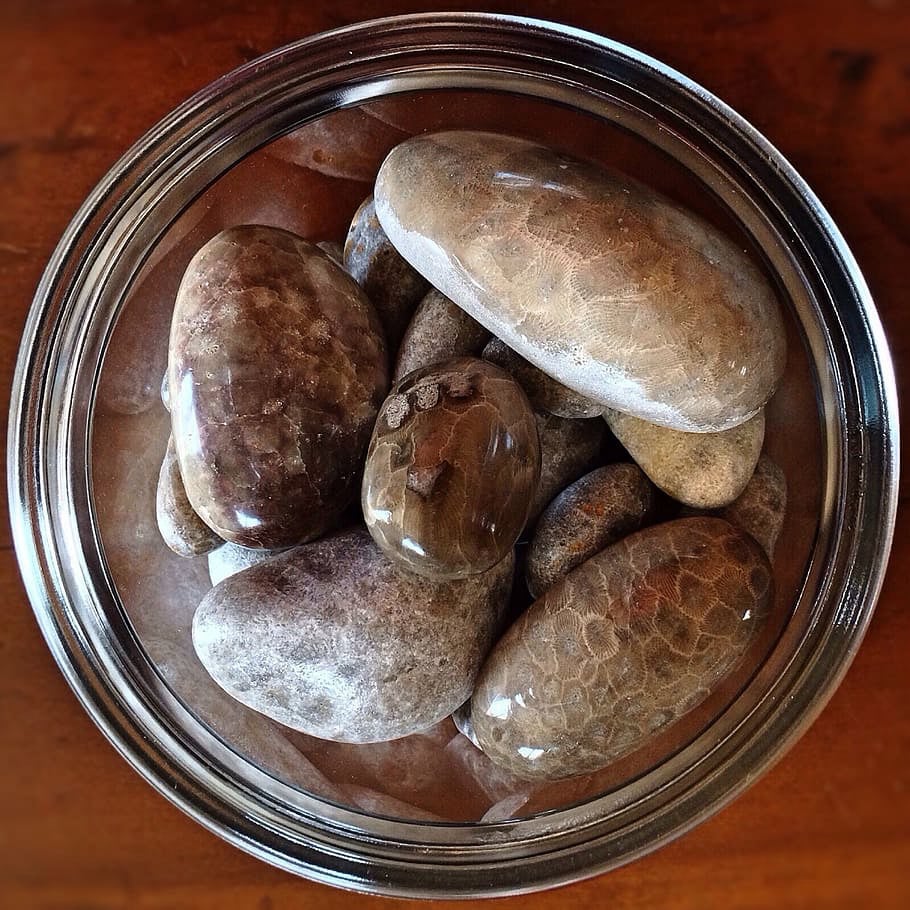 A jar filled with pebbles, seen from above